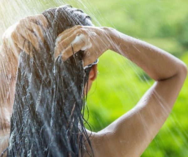 Woman Using Eco Friendly Shampoo